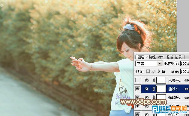 Photoshop给绿树边的美女调出柔和的橙黄色