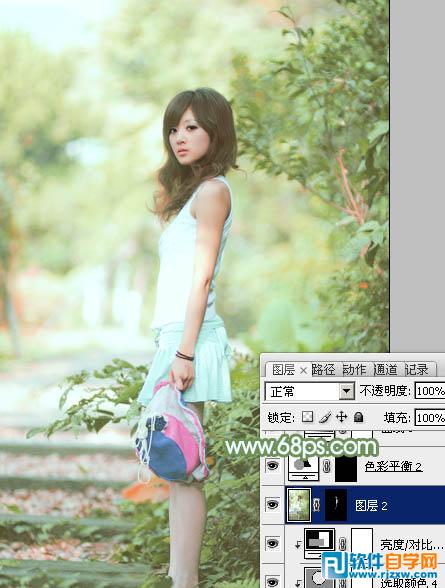 Photoshop给树边美女加上唯美的淡调嫩绿色